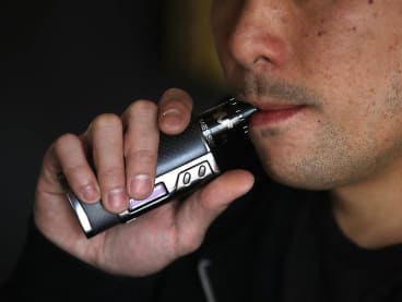 A file photo of a man vaping.