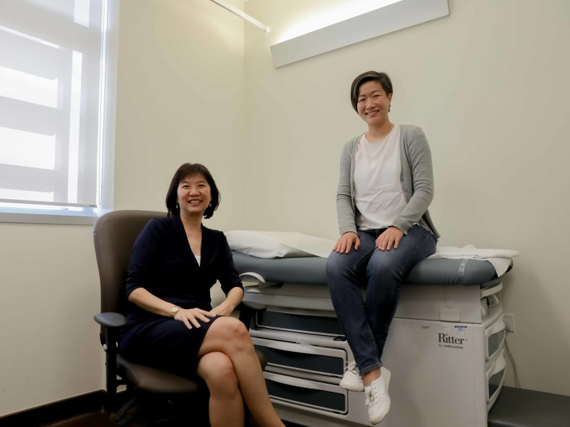 Ms Wu Ying Ying (right) and Dr Lim Siew Eng in a consultation room at the National University Hospital (NUH) Medical Centre.