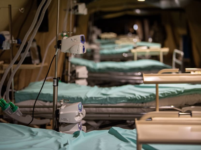 A picture shows intensive care units with respiratory aid machines set up under a tent at a military field hospital at the Emile Muller Hospital in Mulhouse, eastern France, on March 22, 2020.