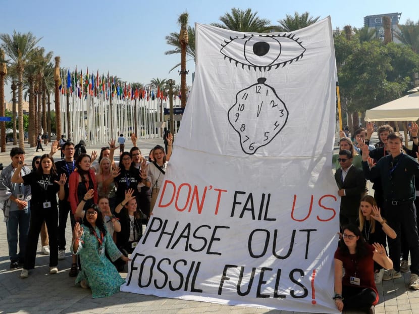 Climate activists attending a protest against fossil fuels at Dubai’s Expo City during the United Nations Climate Change Conference COP28 in Dubai, United Arab Emirates, on Dec 12, 2023.