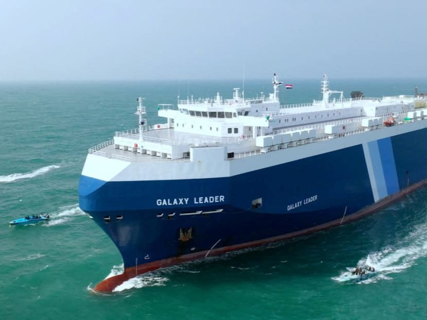  The Galaxy Leader cargo ship is escorted by Houthi boats in the Red Sea in this photo released on Nov 20, 2023 by Houthi Military Media.
