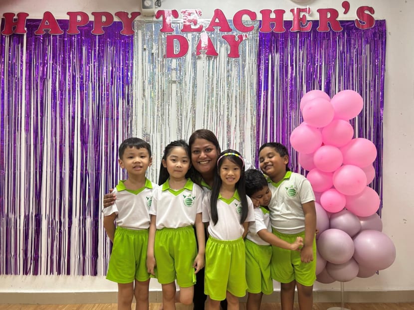 Gen Y Speaks writer Puvaneswary G Tanagopal photographed with students.