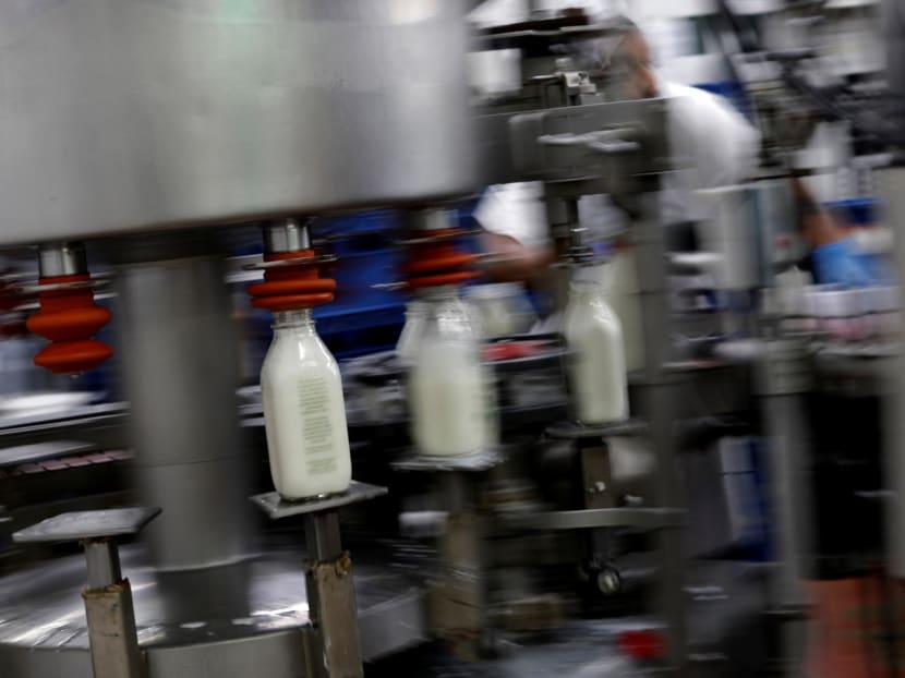 Bottles of milk are been processed at the South Mountain Creamery farm in Middletown, Maryland US, on May 19, 2020.