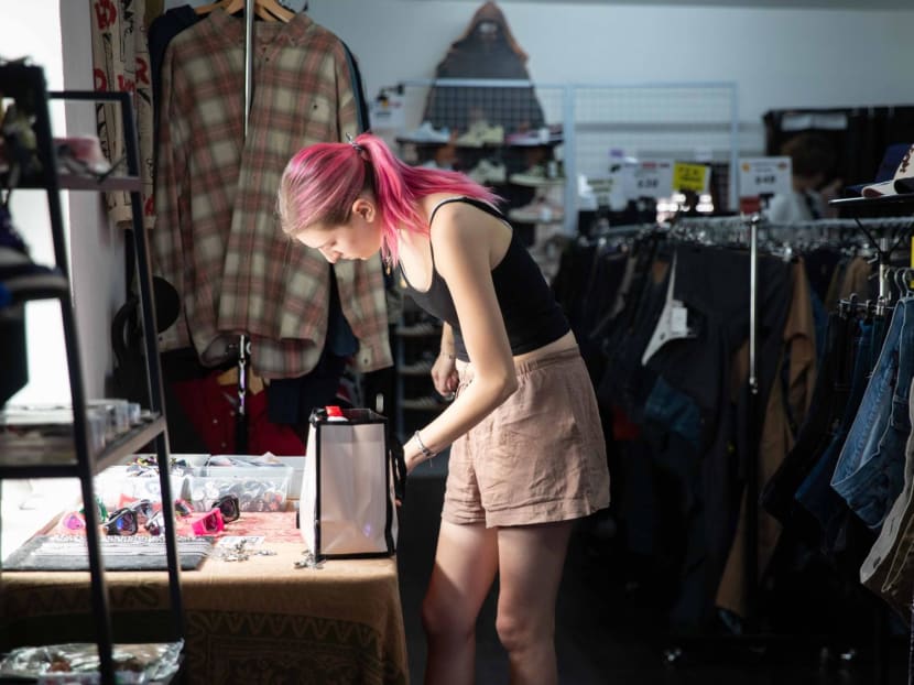 A customer browsing at a thrift store on July 18, 2024. 