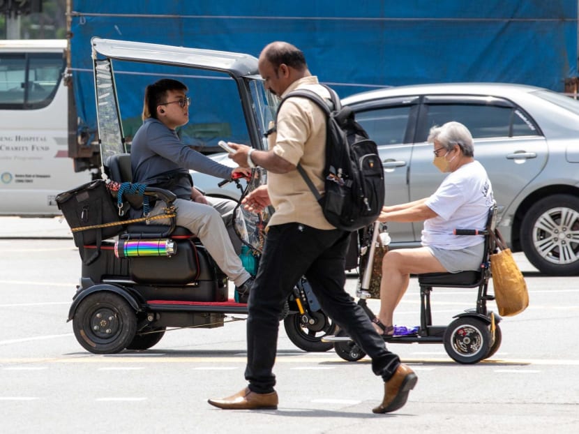 Personal Mobility Aid users seen at a crossing on Aug 15, 2024. 