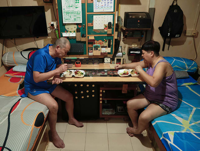 Mr Ng Koon Guan, 60, and his wife Alice Foong, 54, having dinner in their rental flat on Aug 22, 2024. 