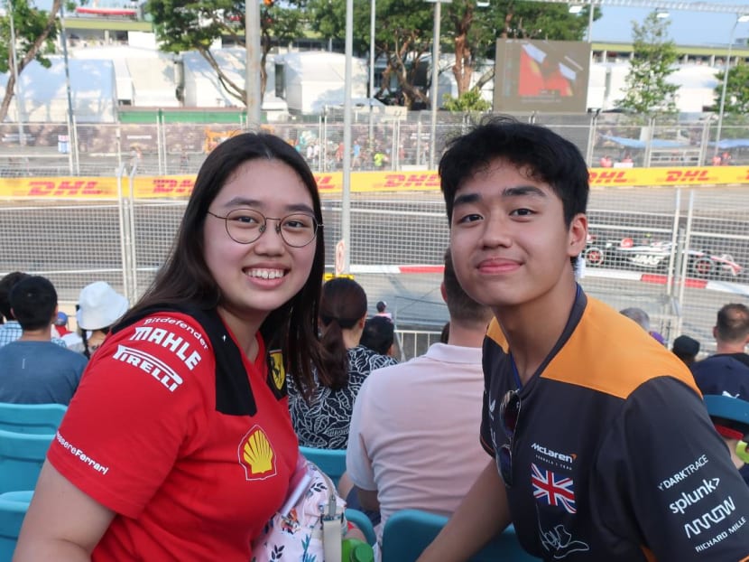 Siblings Samantha Lee, 18 and Kayden Lee, 15, watching a practice round for the Singapore Grand Prix on Sept 15, 2023.  