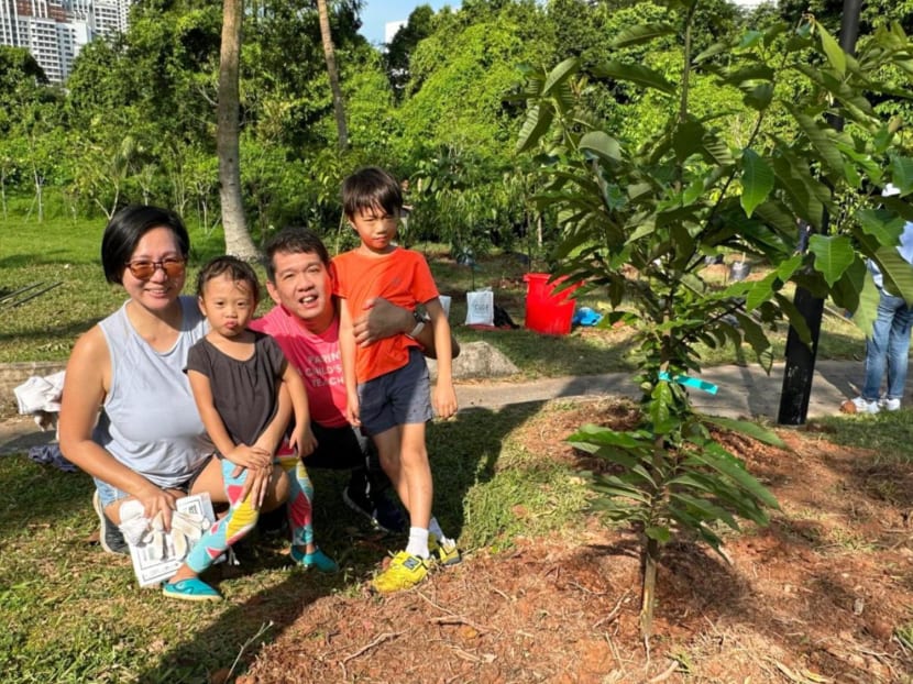 The author, Raymond Lim (second from right), and his family pictured in June 2023, during a tree planting exercise they participated in. He and his wife, Diane, are currently homeschooling both their children.