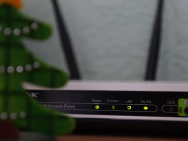 A stock photograph of a Wi-Fi router.